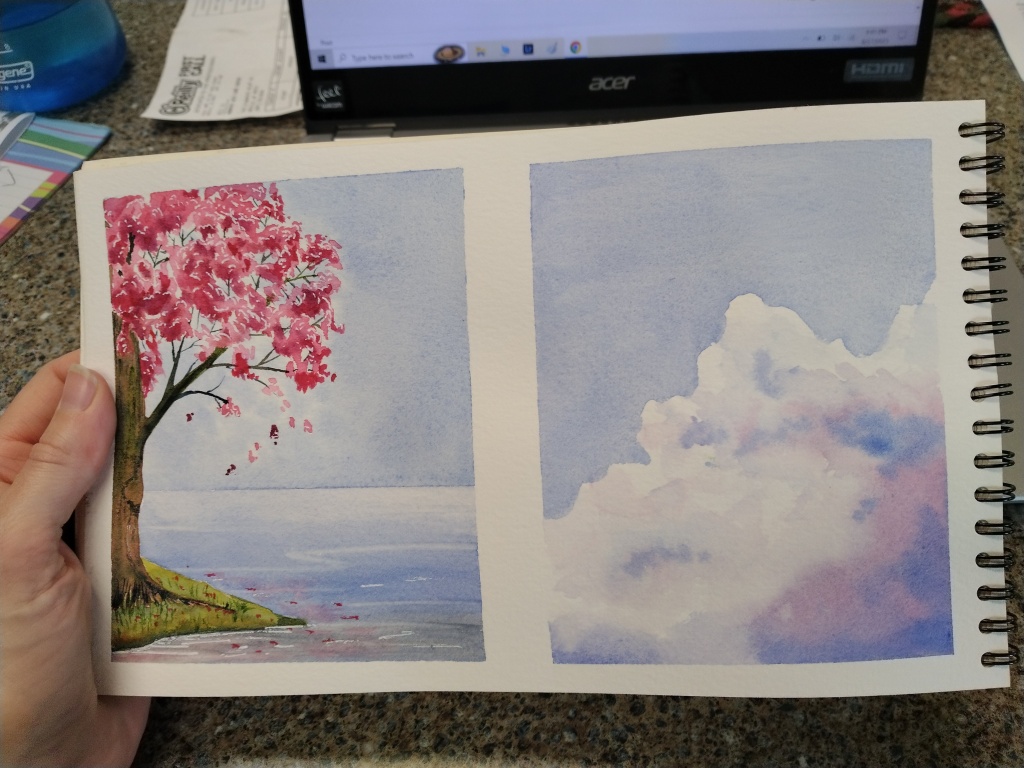 Pink Cherry tree blossoms on a lake painted in watercolor.
Clouds painted in watercolor.