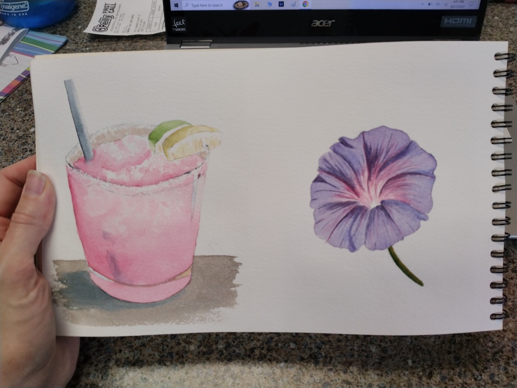Glass of pink lemonade with ice cubes painted in watercolor.
Purple flower blossom piantedi n watercolor.
